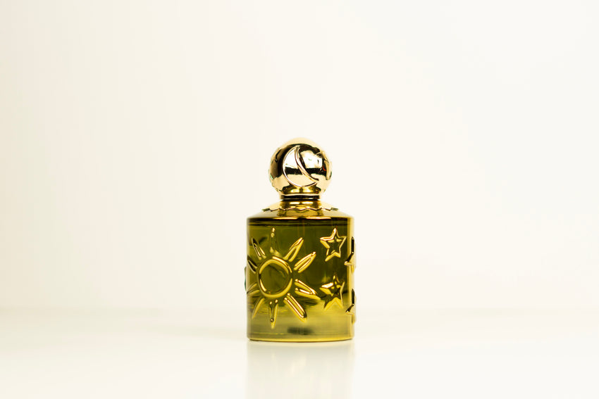 Sun Moon Stars Oro Pour Homme EDP fragrance bottle