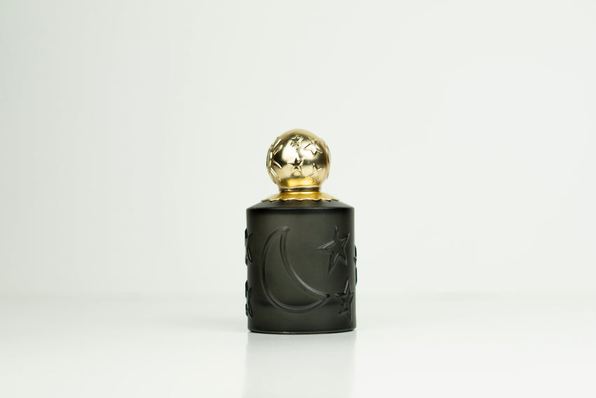 Sun Moon Stars Pour Homme Black EDP fragrance bottle